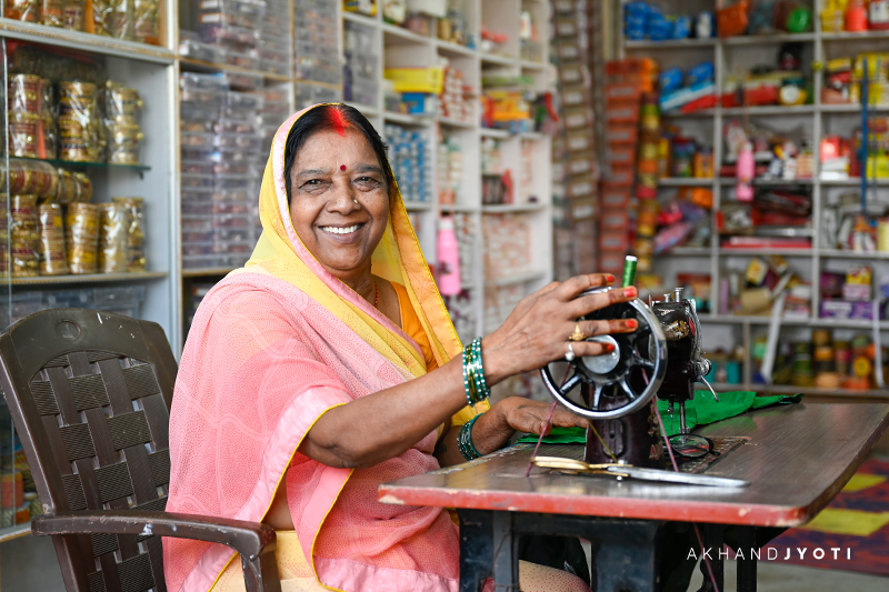 Pana Devi sewing clothes